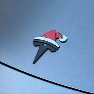 Tesla Emblem Sticker with Red and White Santa Hat